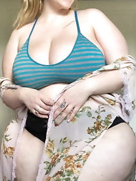 Ultra-sexy plump lass is posing at work